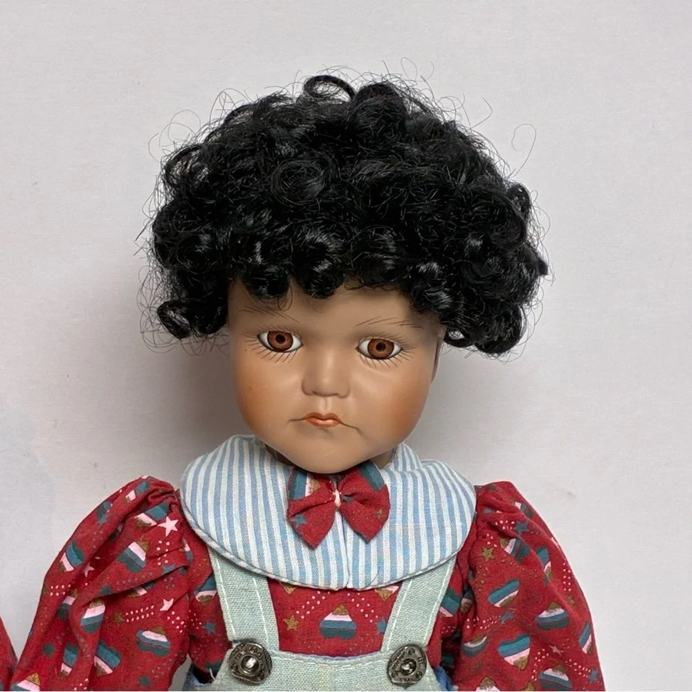 Delton Product Corp. Porcelain Brown Boy Girl Dolls Stands Matching Outfits